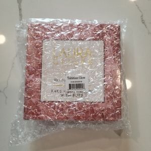 Laura Geller baked body frosting with puff